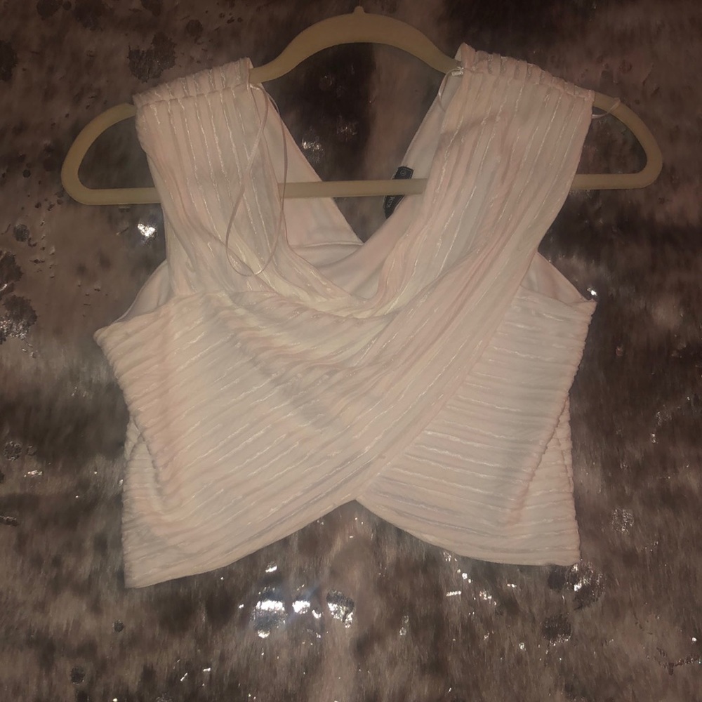 Sleeveless crop top.